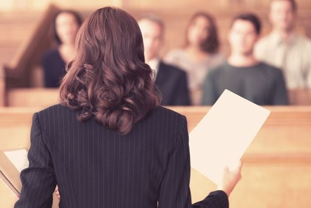 Attorney addressing the jury in a court room