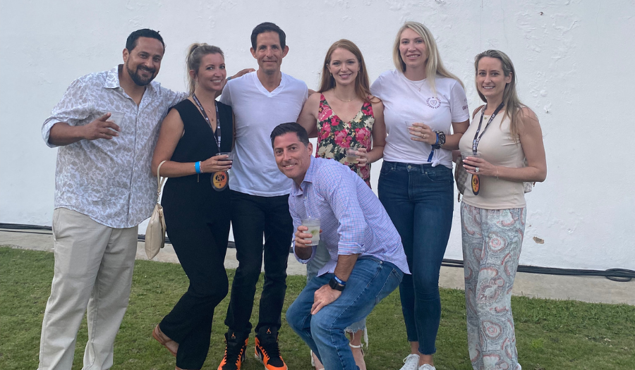 Albert, Maggie, Dylan, Dave, Rachel, Leann, and Carmela standing in a group and smiling