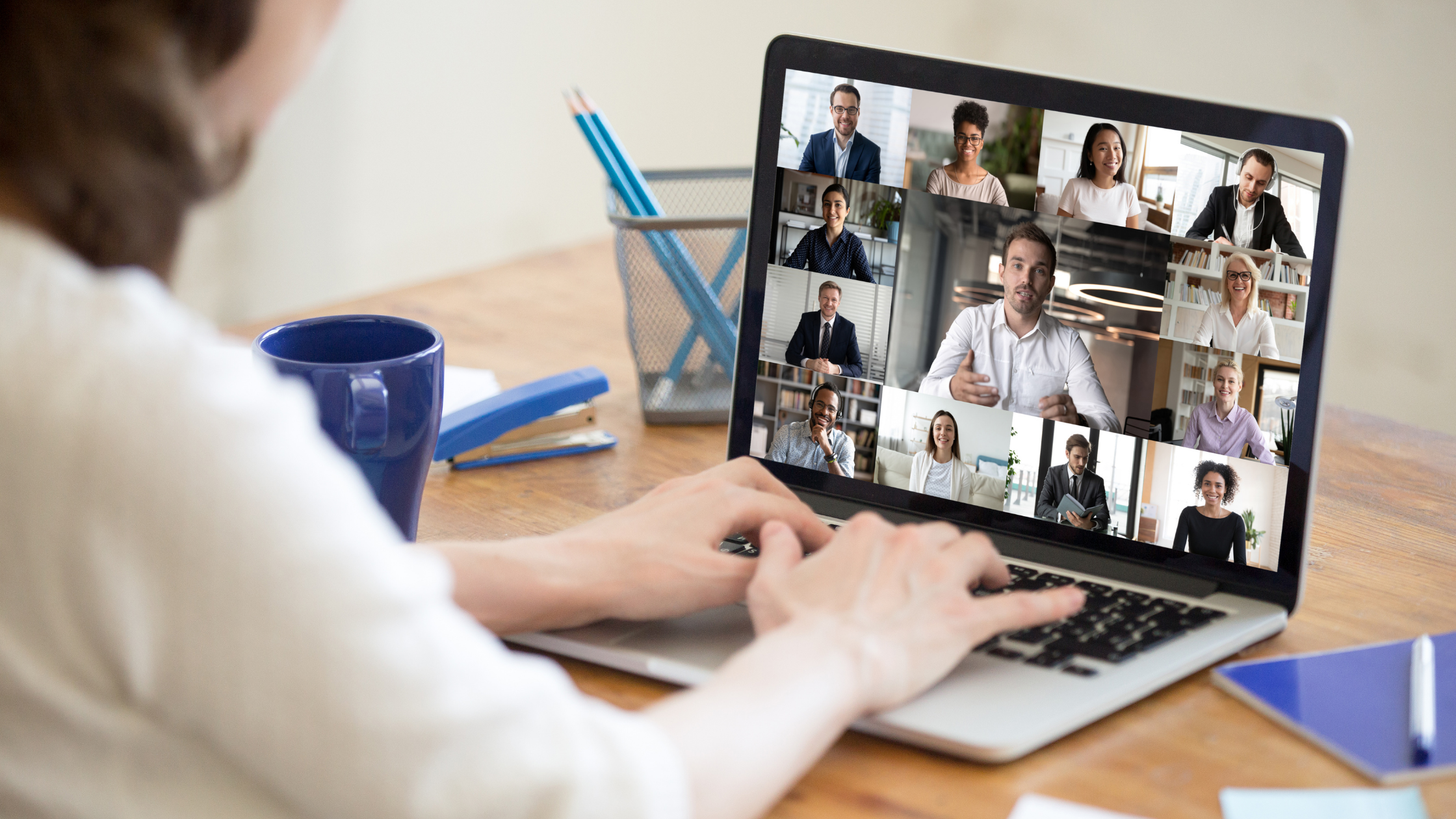 Person at a computer participating in a videoconference