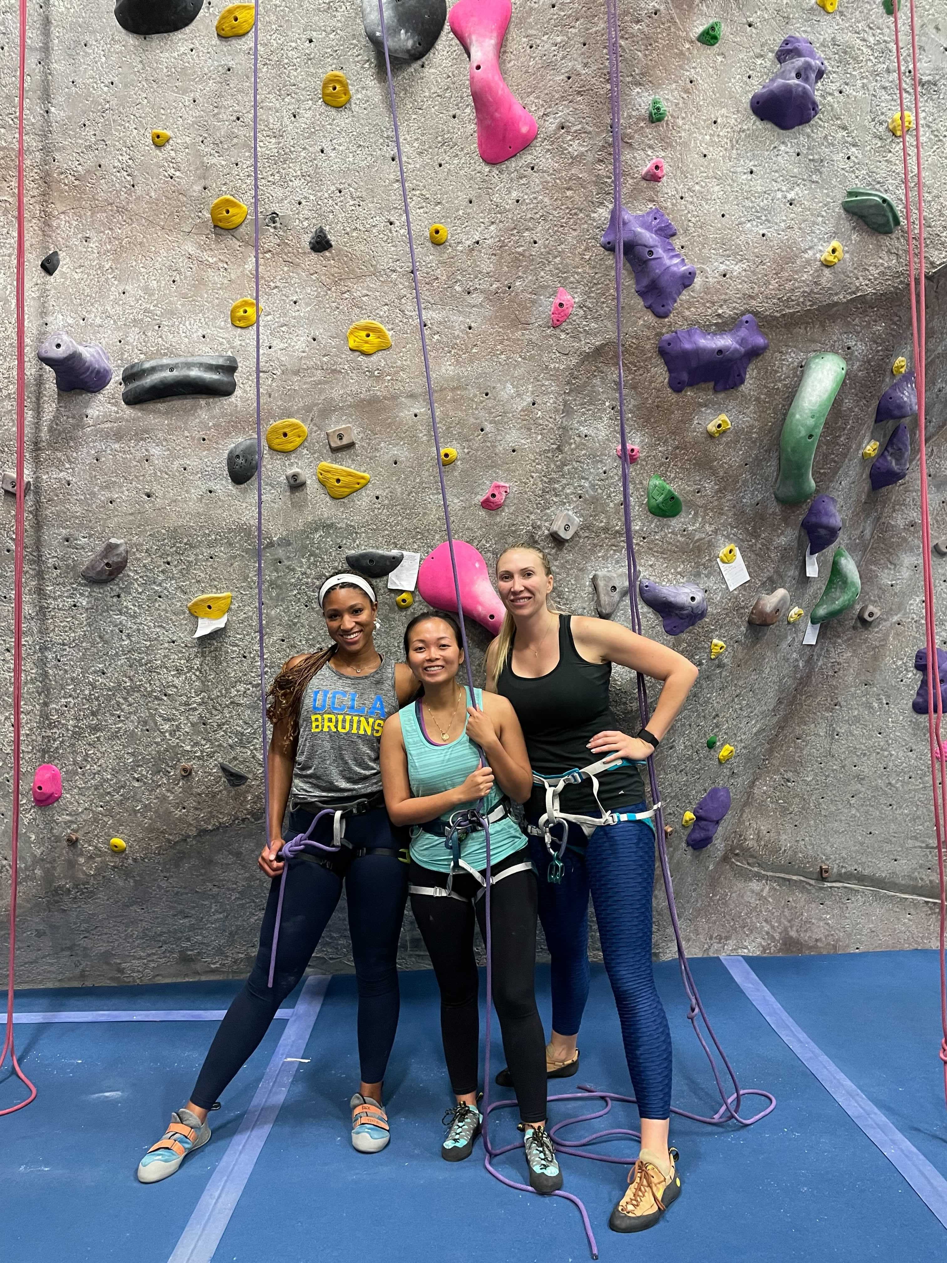 Steno employees at a rock climbinb wall